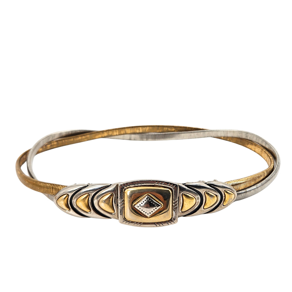 Two-tone metal snake chain stretch belt with ornate oval centerpiece buckle