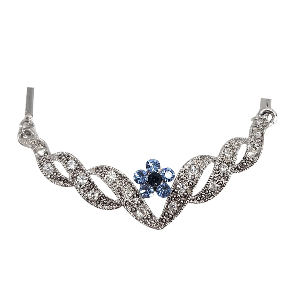 Silvertone rhinestone necklace with blue heart center and floral leaf motif links