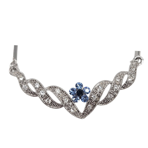 Silvertone rhinestone necklace with blue heart center and floral leaf motif links