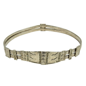 Silver stretch medium belt with ornate geometric panels and textured center plates