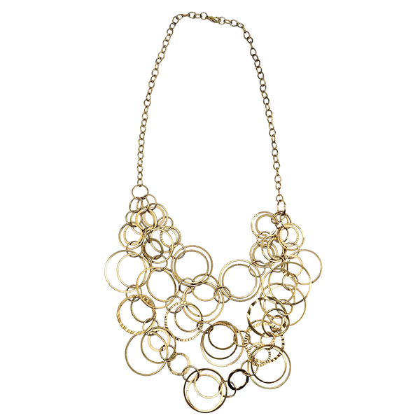 Gold circular bib necklace with layered ring links and chain collar.