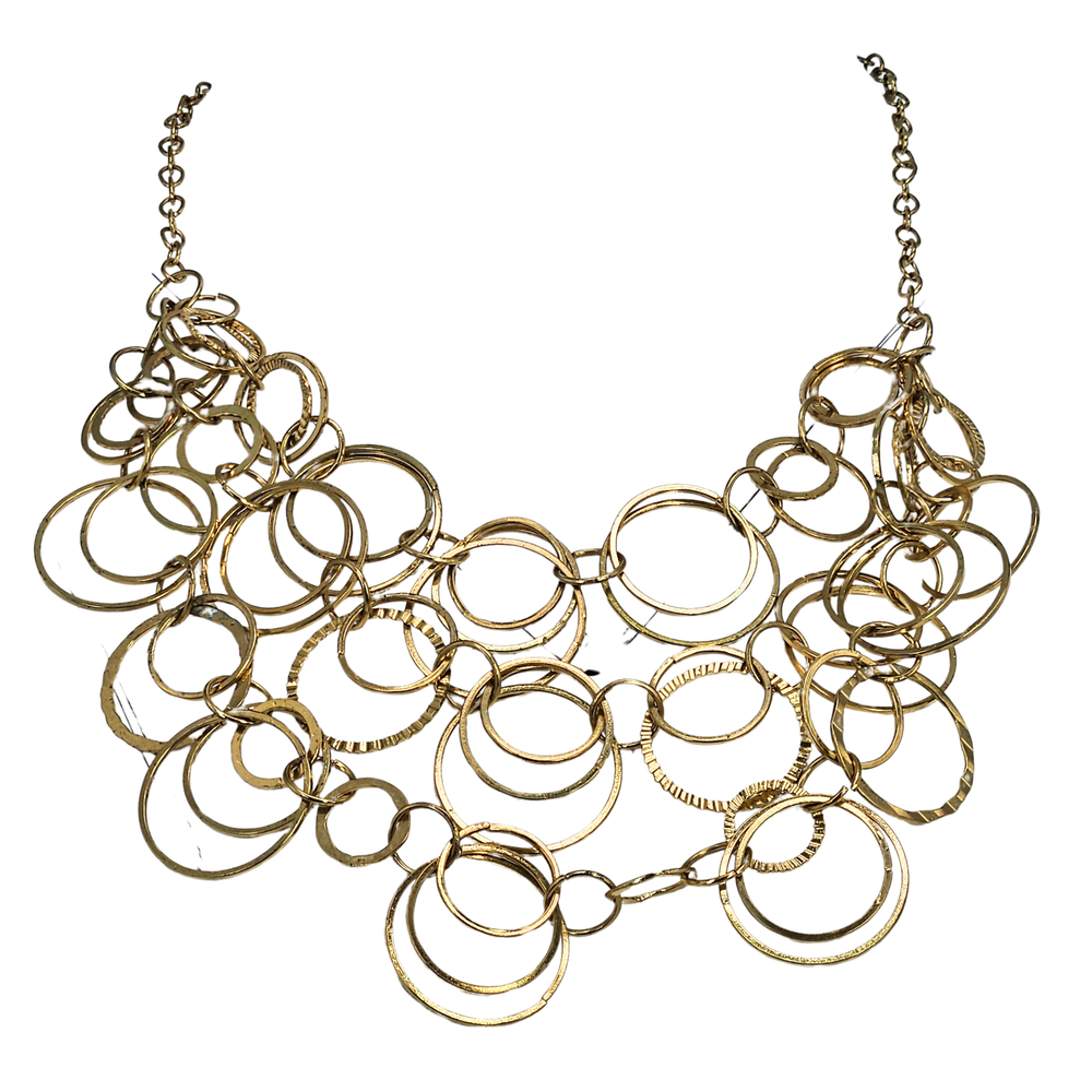 Gold circular bib necklace with layered ring links and chain collar.