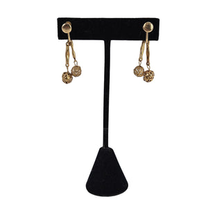 Gold filigree drop earrings with faux pearl top and small dangling coin charms