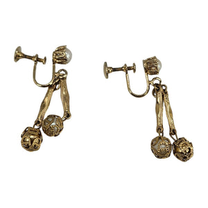 Gold stud earrings with faux pearl bead and hanging filigree charm drops