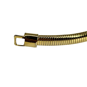 Gold-tone stretch snake belt with square buckle and ribbed metal band
