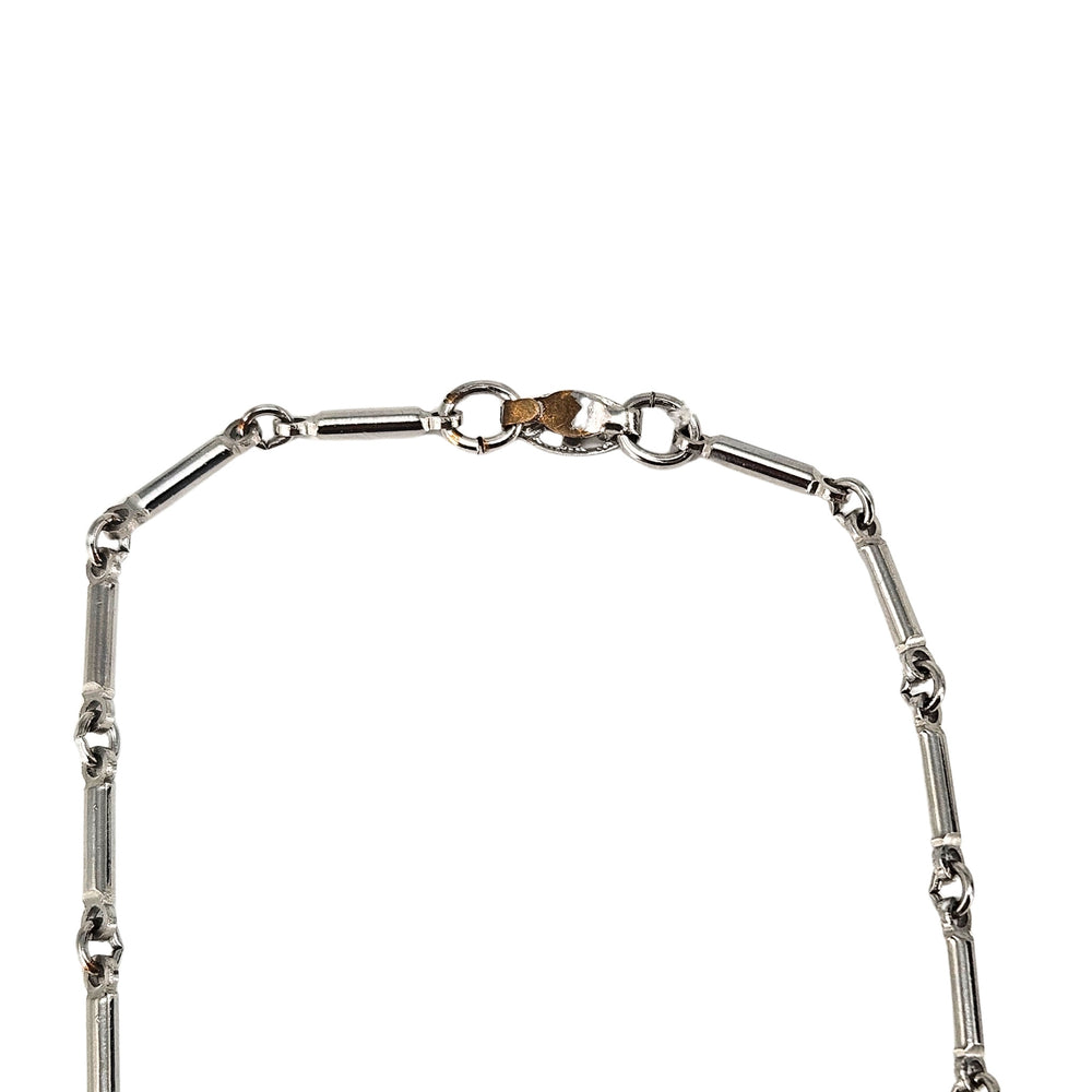 Rhinestone vine collar necklace with silver-tone chain and leaf-like sparkle links.