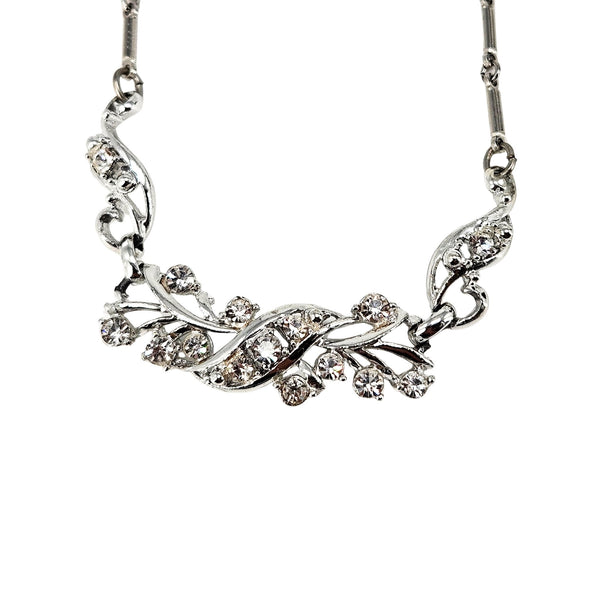Rhinestone vine collar necklace featuring leaf-and-flower motifs along the front.