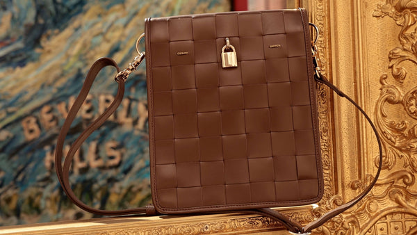 Chocolate woven leather crossbody bag with square grid texture and top lock clasp