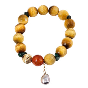Yellow faceted gemstone stretch bracelet with pearl dangle and dark green accents