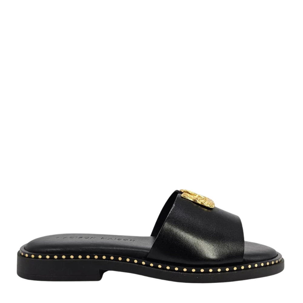 Black leather slide sandal with gold hammered buckle and studded trim
