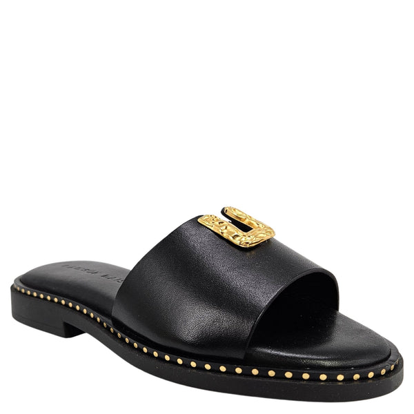 Black leather slide sandal with open toe, gold buckle, and studded edge trim