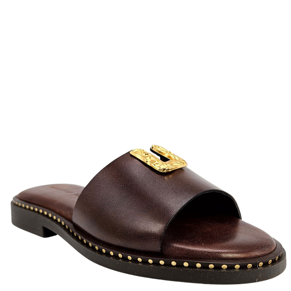 Chocolate-brown leather slide sandal with gold hammered buckle and studded edge
