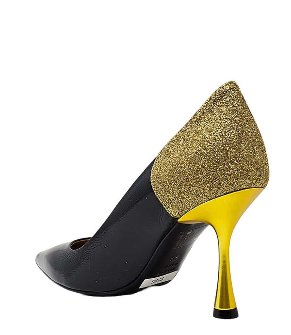 Black pointed-toe pump with gold glitter cuff and tall gold stiletto heel