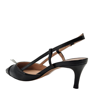Black leather slingback with kitten heel, side buckle strap, and pointed toe