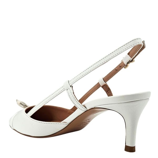 White leather slingback pumps with kitten heel, open back strap and ankle buckle