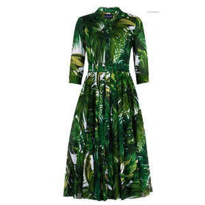 Green palm-print midi dress with collared neckline, flared skirt, 3/4 sleeves