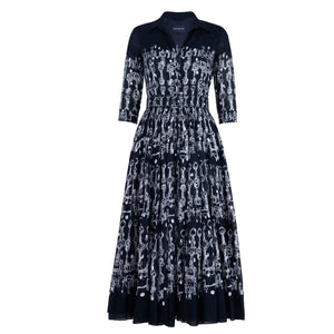 Deep indigo horse-chain print long-sleeve midi dress, button-front style, gathered waist
