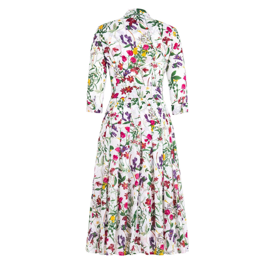 White floral tiered midi dress with 3/4 sleeves and collared button-front