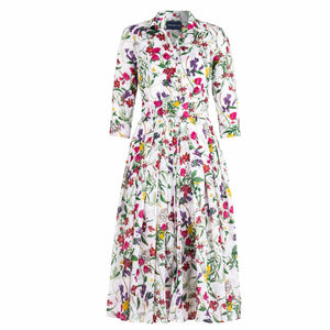 White floral tiered midi dress with 3/4 sleeves and collared button-front