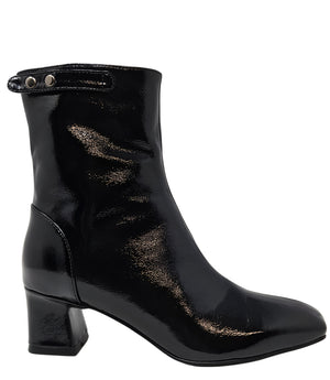 Black patent leather zip-up boot with mid block heel, side pull tab