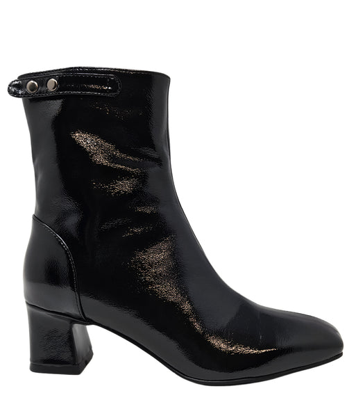 Black patent leather zip-up boot with mid block heel, side pull tab