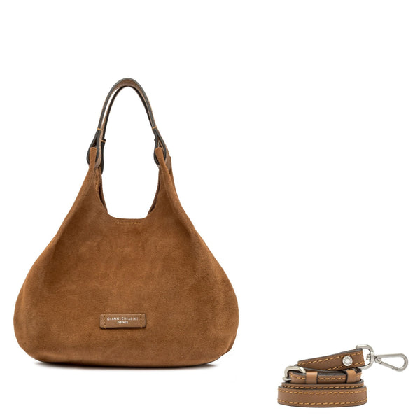 Caramel leather mini hobo bag with front logo patch and included detachable key strap