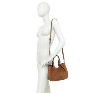 Caramel leather hobo bag on mannequin with crossbody strap and small front logo