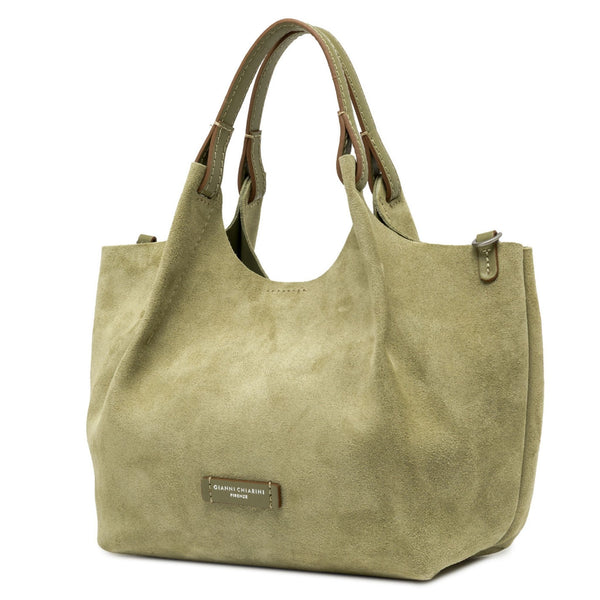 Light green suede mini hobo bag with front logo patch and short top handles.