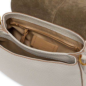 Off-white leather shoulder bag interior view with lined compartments and branded leather patch
