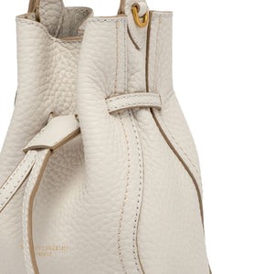 Off-white leather bucket bag side view with front flap detail and gold-tone buckle