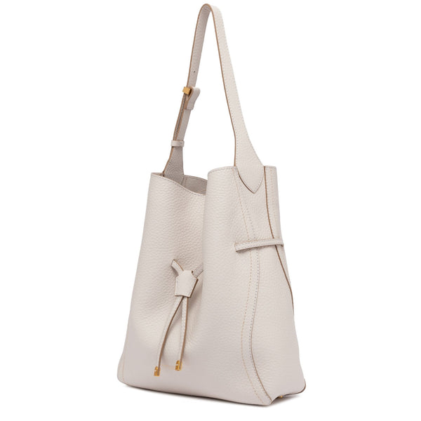 Off-white leather bucket bag with adjustable shoulder strap and front pocket