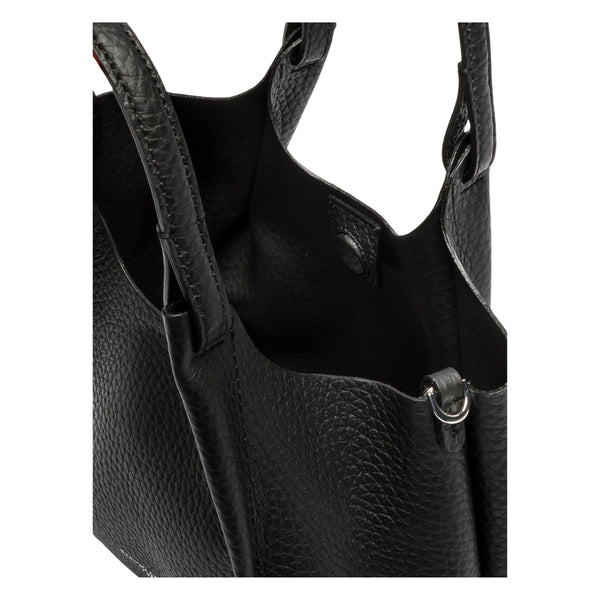 Black leather hobo bag interior with open pocket and metal D-ring at side