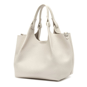 Off white leather hobo bag with top handles and side zip pocket detail