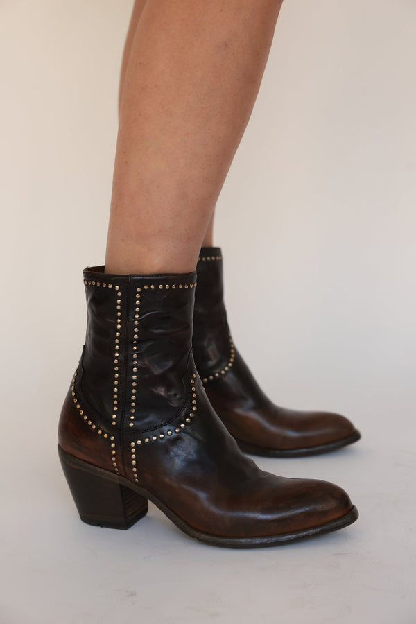 Black leather western ankle boots with gold stud trim and side zip, block heel