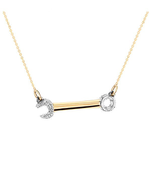 Gold tone necklace with bar pendant and round heart and stone charms on a thin chain