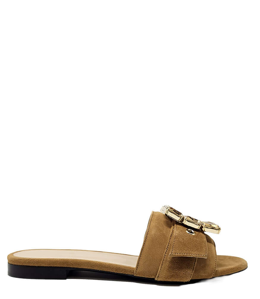 Khaki suede slide sandal with jeweled buckle detail and flat dark sole