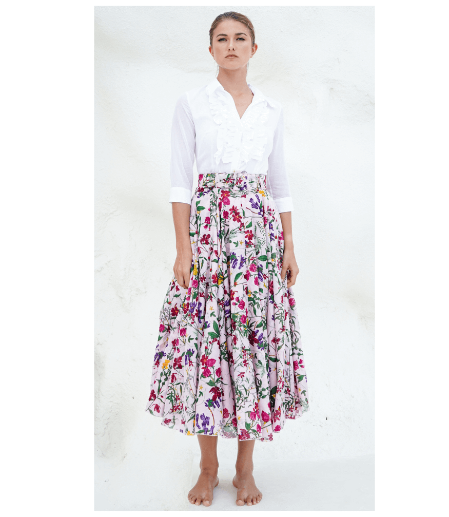 Floral midi skirt close-up: gathered waistband with pink, purple and green blooms on nude
