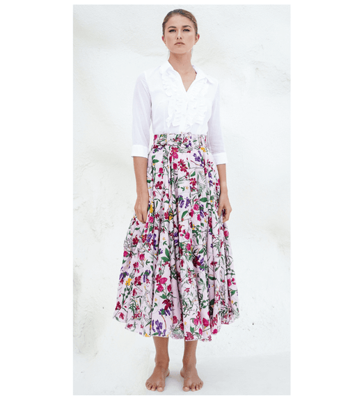 Floral midi skirt with gathered waist and tiered pleats on a light nude base