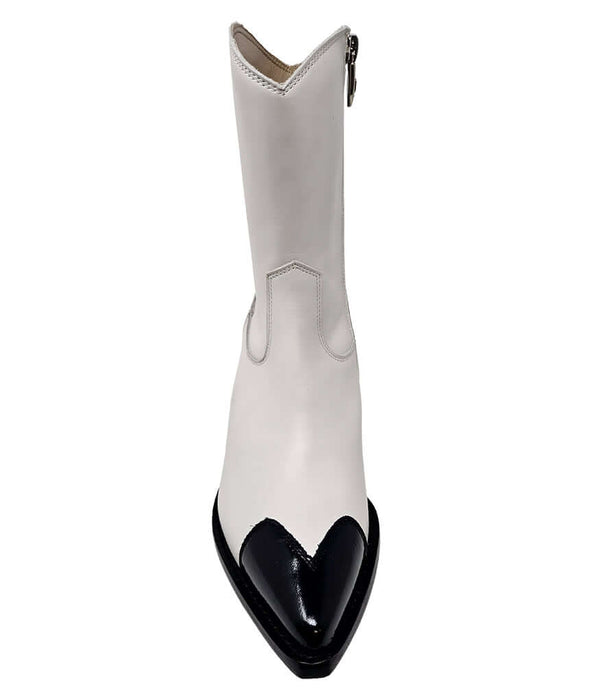 White ankle boot with side zipper and black heart-shaped toe detail