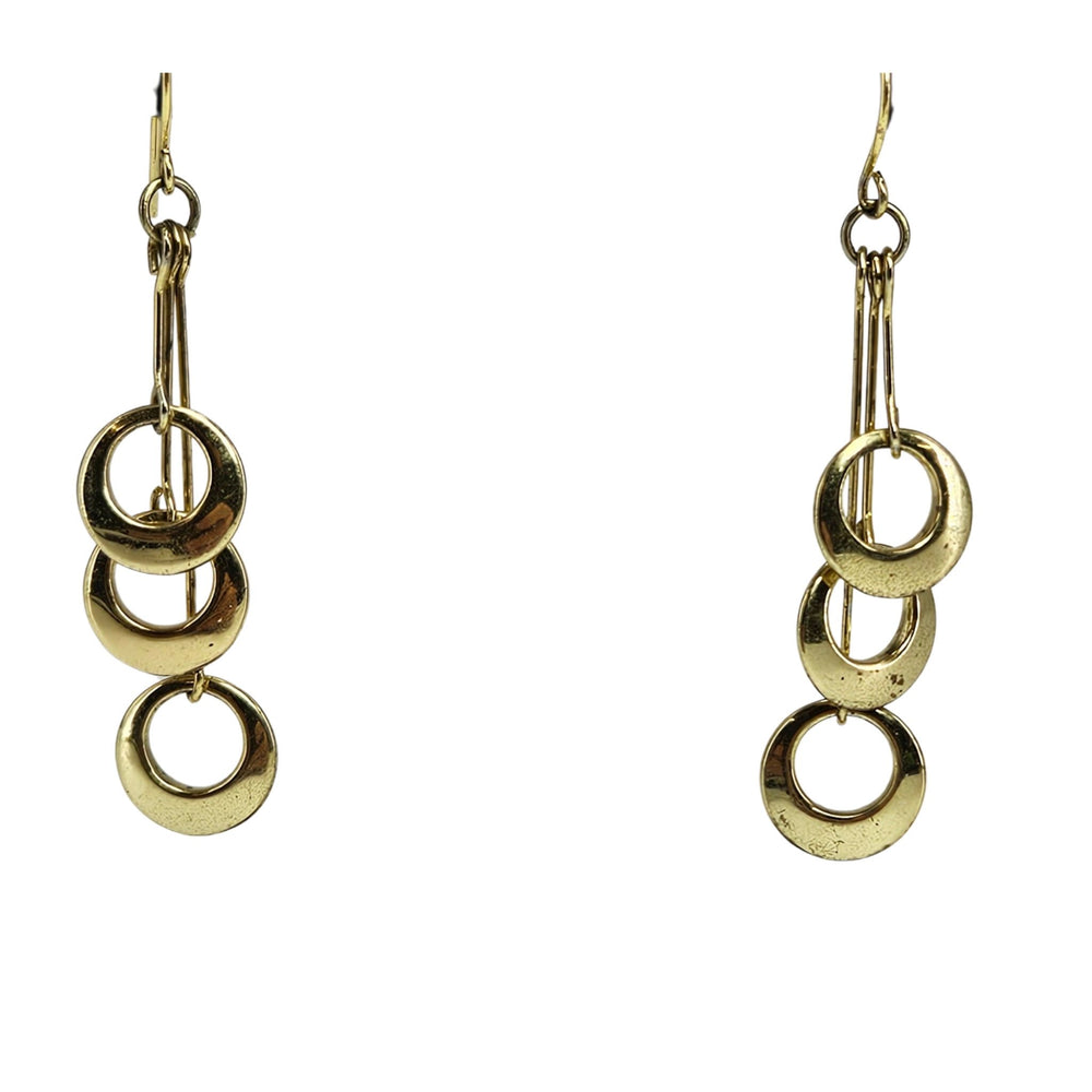 Goldtone dangle earrings with three stacked circles