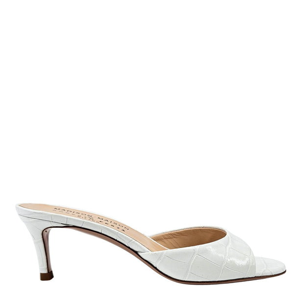 White croc-embossed heeled slide mule with open toe and sculpted heel