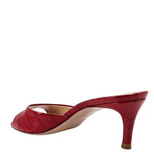 Red croc-texture mule slide sandal showing angled side and slim heel
