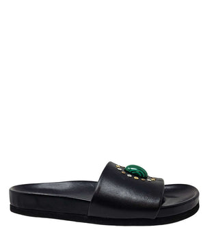 Black open-toe slide sandal with padded footbed and decorative oval gem detail