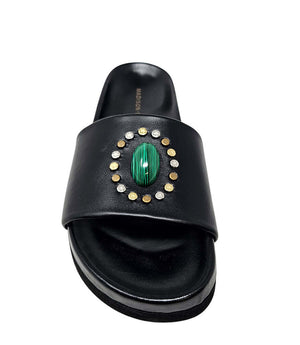 Black open-toe sandal with green oval center ornament and gold stud border