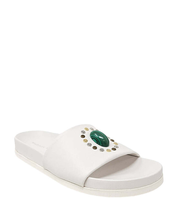White open-toe slide sandal with green center ornament and textured gold dots