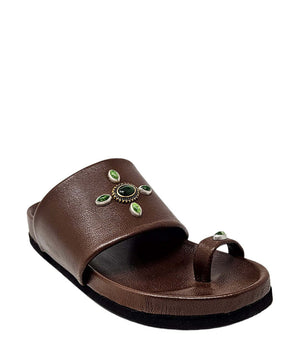 Brown wide-strap toe-ring sandal with green gem cluster on the upper