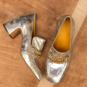 Gold/silver leather mid-heel loafer with chain detail, metallic pointed-toe design