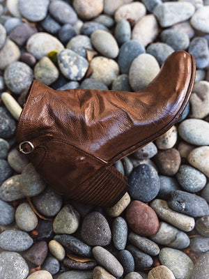 Cognac leather ankle boot with rounded toe and stitched side panels