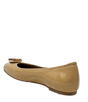 Beige ballet flats rear side view with low sole and jeweled buckle at top