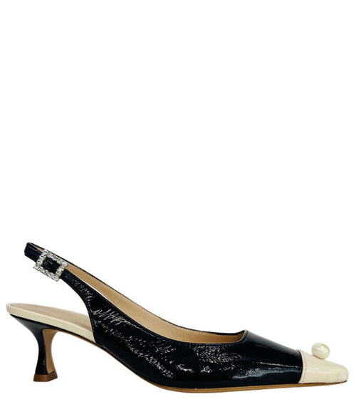 Navy patent slingback kitten heel with off-white cap and pearl strap detail